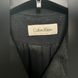 Black floor length wool Calvin Klein winter coat. Like new. Size 10
